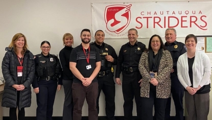 Pictured, from left to right: Director of Mentoring and Advocacy Erika Muecke; Fredonia Police Officer April Echevarria; Sergeant Rachael Waid; Training Director and Mentoring Coordinator Eimelec Perez; Chautauqua County Sheriff's Deputy Jacis Blake; Chautauqua County Sheriff Jim Quattrone; Solimar Vazquez, Secretary to Chautauqua County Executive; UPMC Chautauqua Security Officer James Rensel; UWAY SCC Marketing & Resource Development Manager Nicole Gustafson. Photos by Jamestown Public Schools